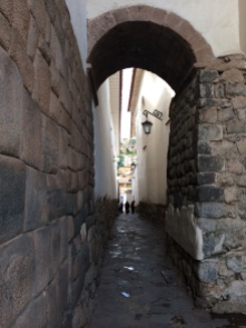 Inka stone lines the walls of this beautiful passageway. (Cusco, Peru)
